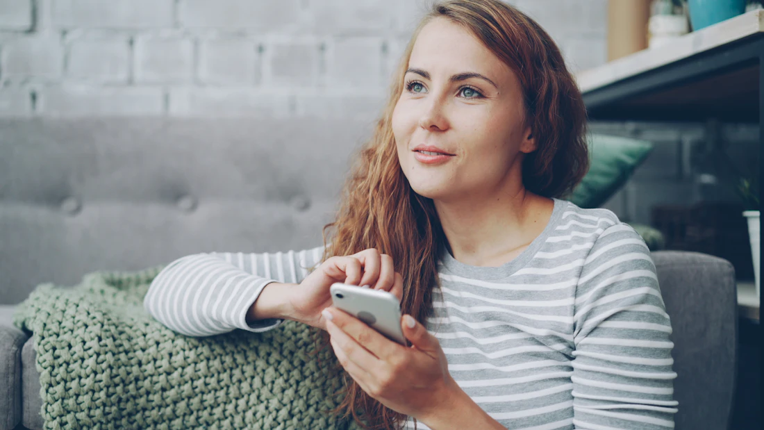 Homeowner booking a next day house cleaning online from her phone in under 30 seconds