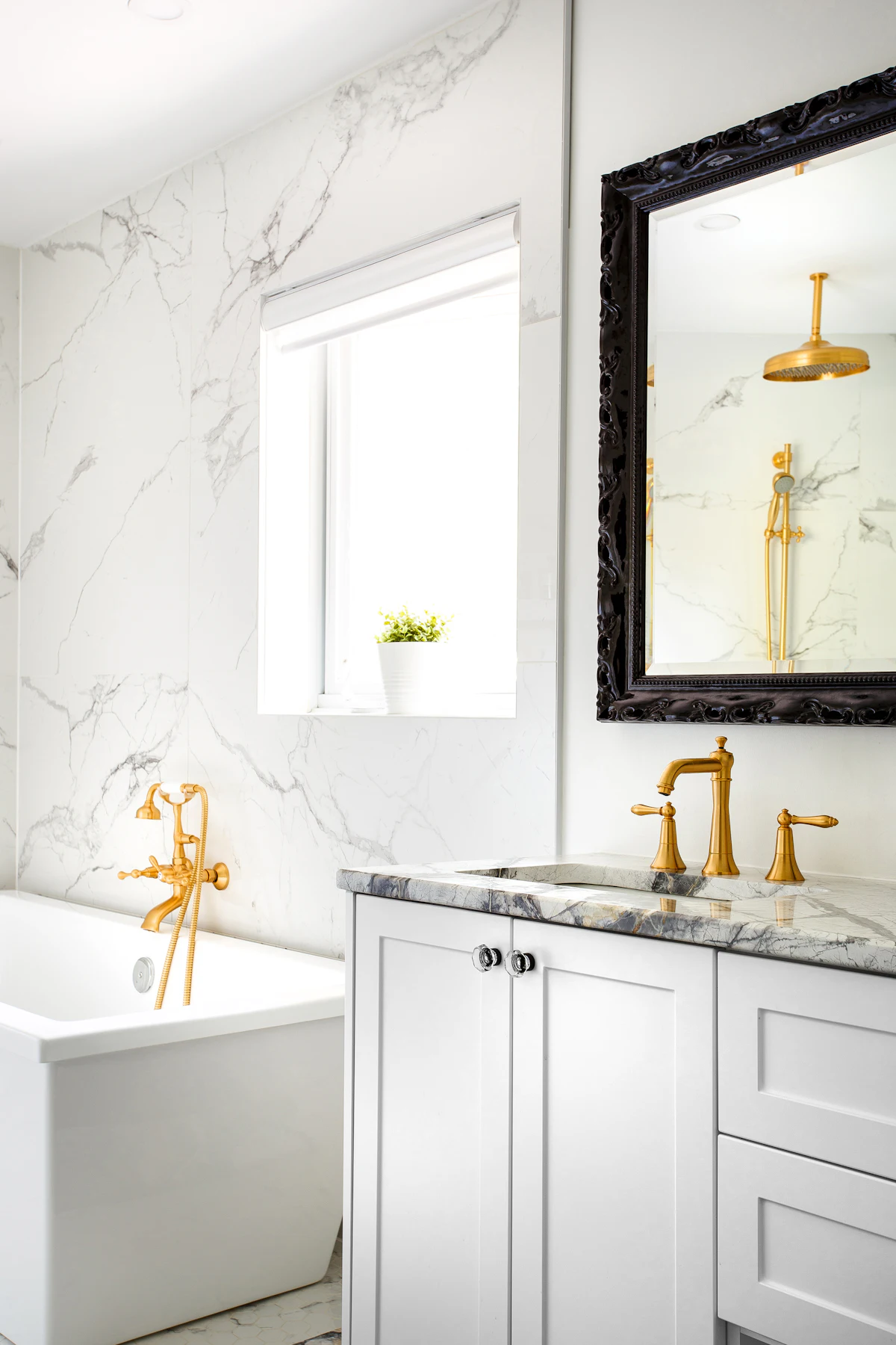 Freshly scrubbed white bathtub and tiled surround in a Toronto condo bathroom